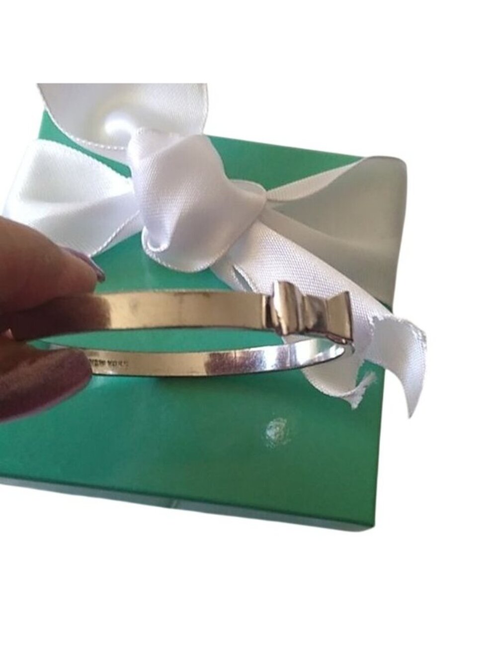 Kate Spade New York Take A Bow Bangle Bracelet, Silver, 2 3/8" opening - Picture 3 of 7